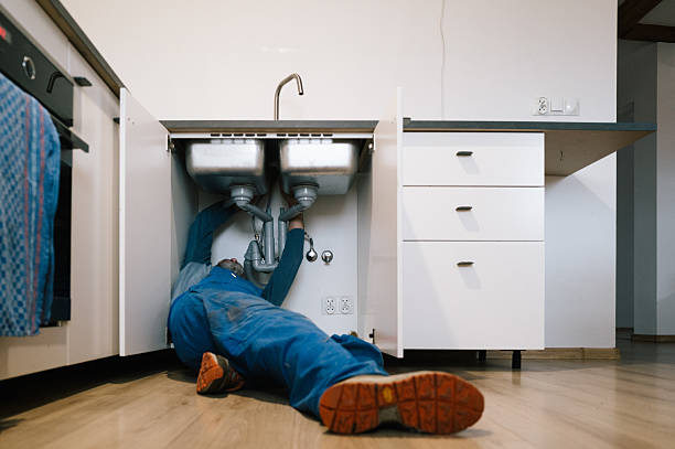 Professional Emergency Plumber technician working in Macomb, MO